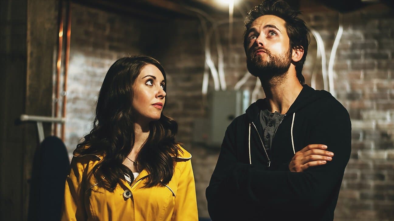 No Stranger Than Love backdrop