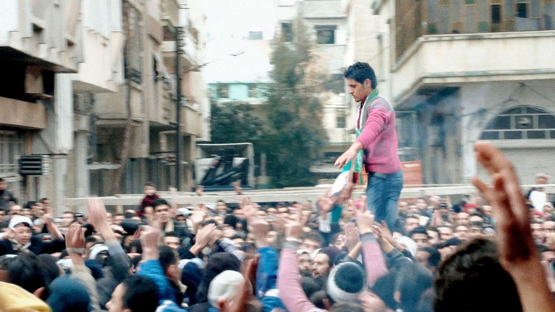 Return to Homs backdrop