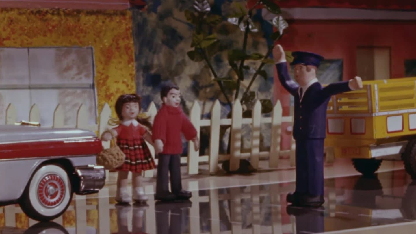 David And Jennifer Learn Their Kerb Drill backdrop