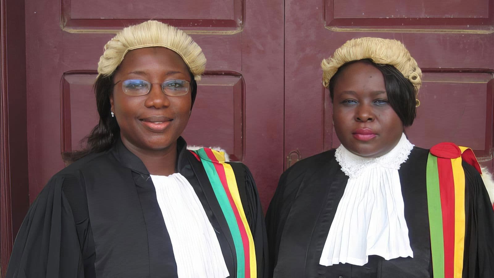 Sisters in Law backdrop