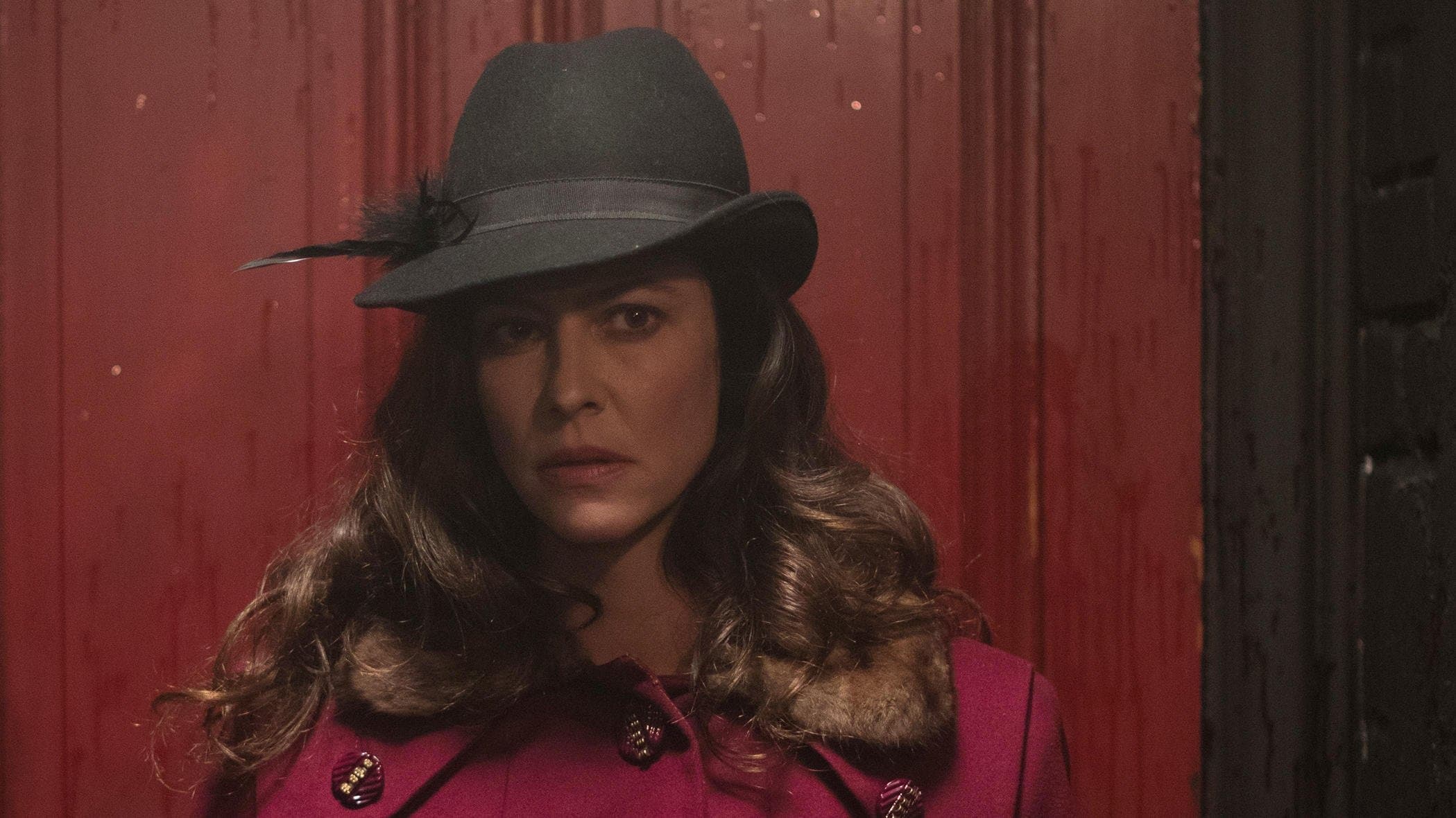 The Most Assassinated Woman in the World backdrop